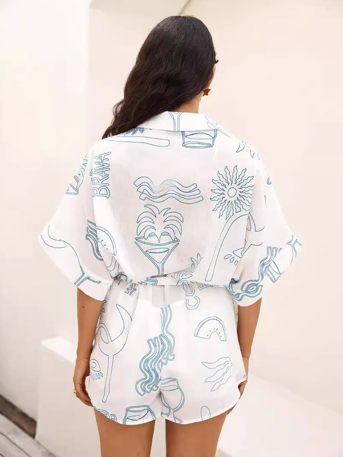 Zephariel Printed Collared Neck Half Sleeve Romper