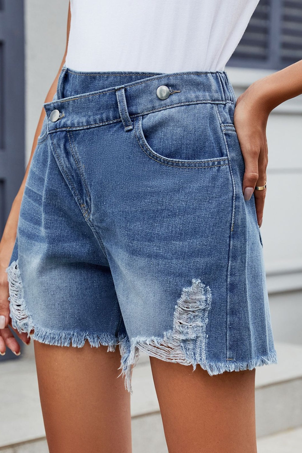 Zephariel Distressed Raw Hem Asymmetric Waist Denim Shorts